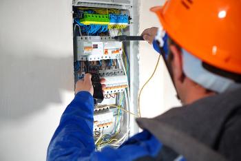 EICR energy performance certificate provider in London and UK. Electrician testing electrical system.