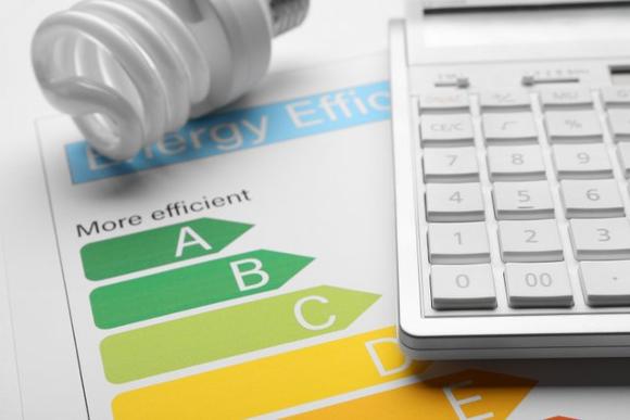 energy performance certificate provider in London and UK. Light bulb and calculator.